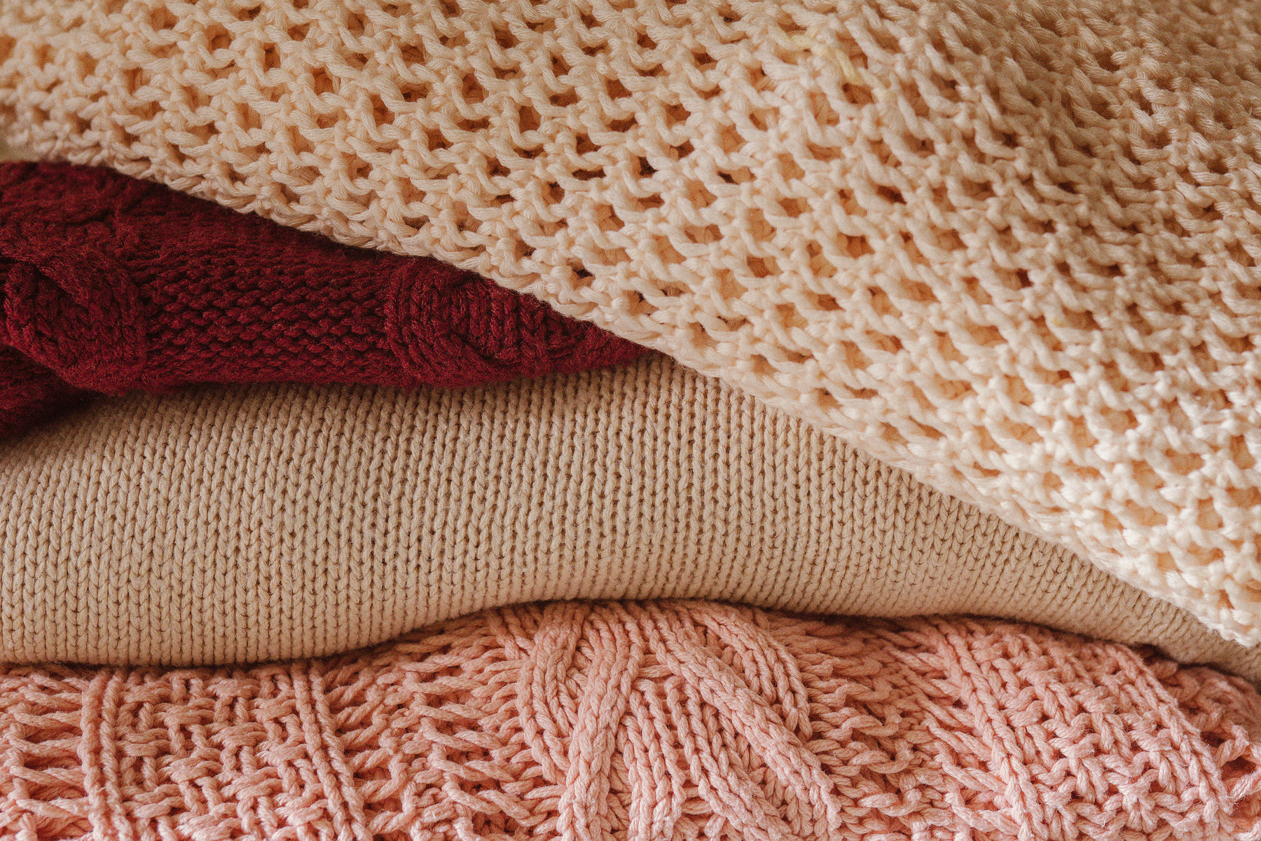 White Knit Textile on Brown Textile